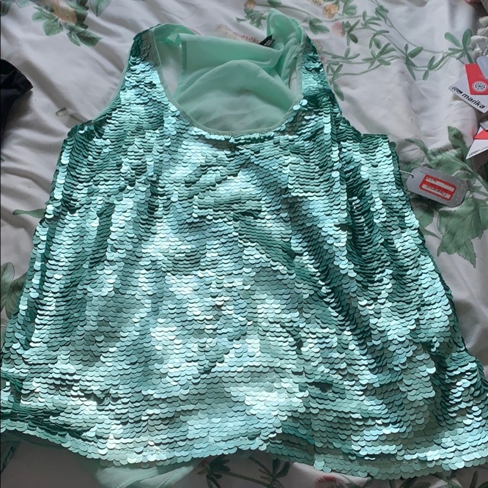 Sequin tank top with linen back.